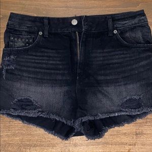 Distressed black denim